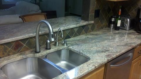 Image Granite Slab with tile backsplash